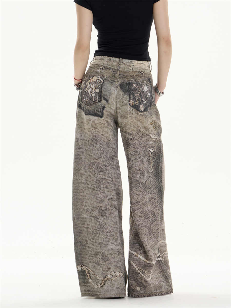 Jeans retrò logori lavati con fascino rilassato a gamba larga