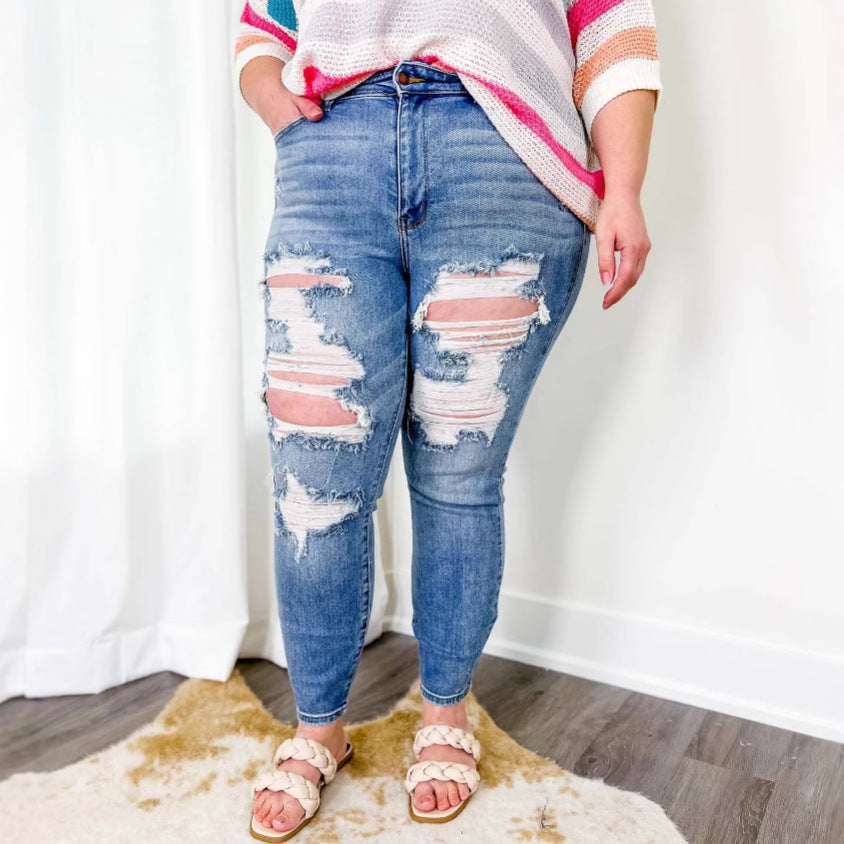 Distressed Light-Wash Skinny Jeans with Extended Knee Rips