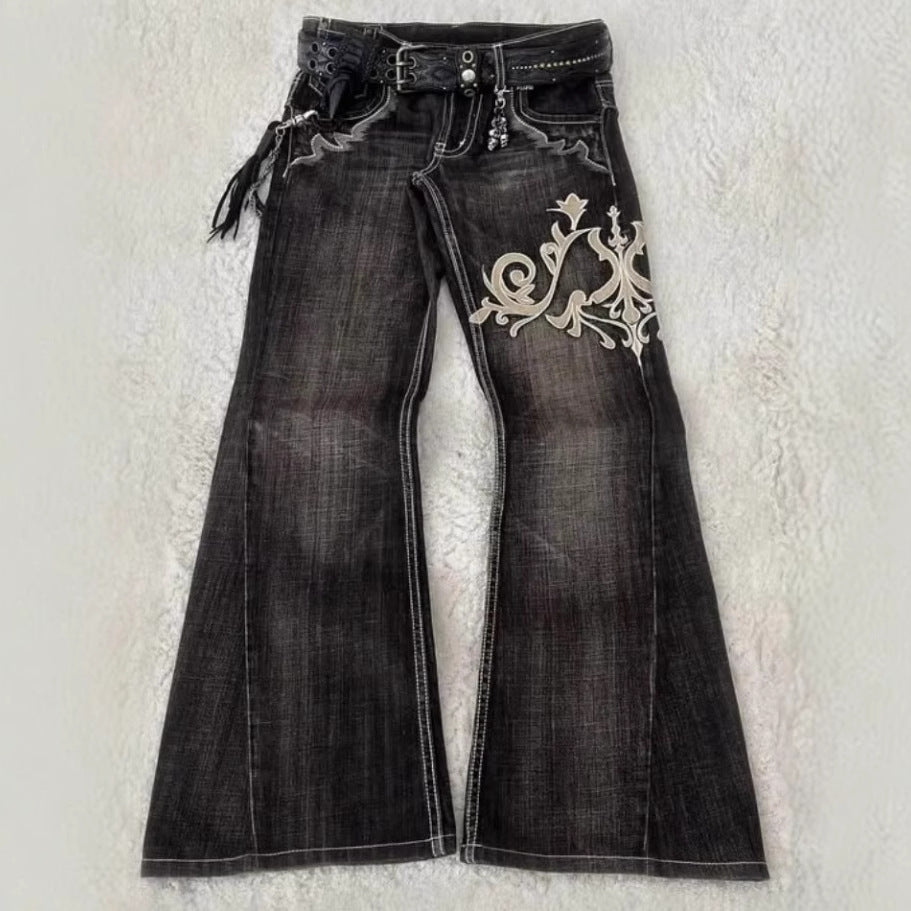 Jeans bordados de moda con elegancia cosida a máquina