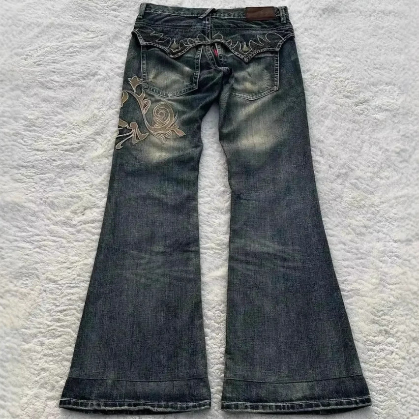 Jeans bordados de moda con elegancia cosida a máquina