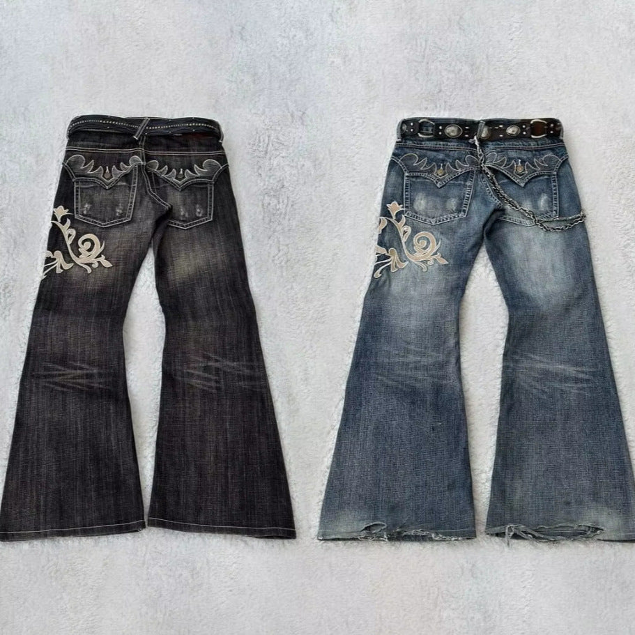 Jeans bordados de moda con elegancia cosida a máquina
