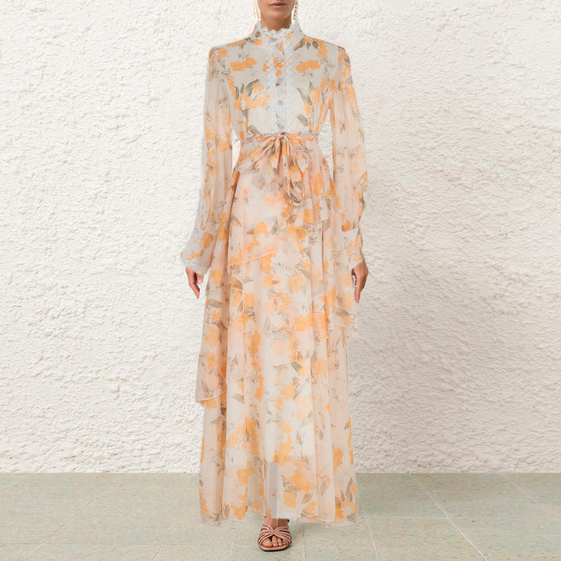 Robe à vol en dentelle à volants avec charme d'ourlet irrégulier